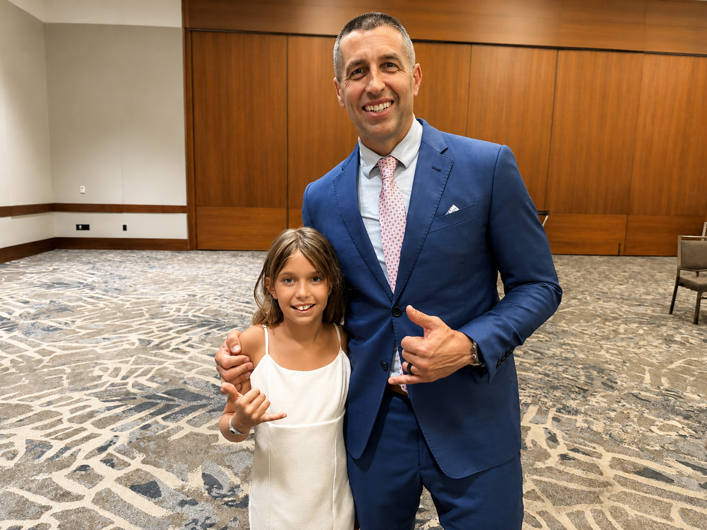 Richard C. Wilson with one of his daughters at a Family Office Club event